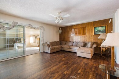 Large living room with slider to huge enclosed patio/bonus room!