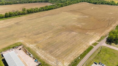 Birds eye view of property with a rural view