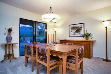 DINING AREA WITH VIEWS TO PATIO