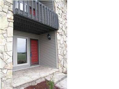 THE FRONT PORCH OFFERS SHELTER WITH THE ALCOVE LAY