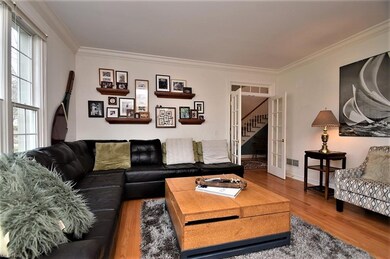 Living room with wood floors, French doors and cro