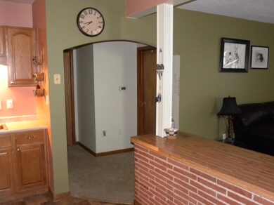 view from kitchen to hall & living room
