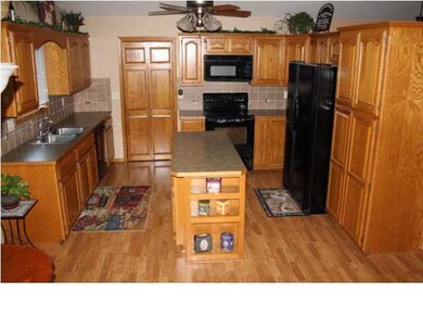 Kitchen is updated with new laminate countertops, 