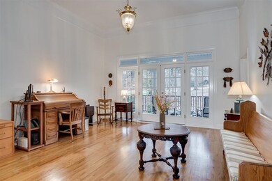 LR with french doors to covered porch.