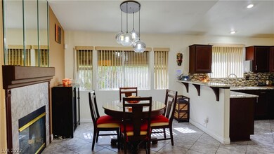 Dining area with two-way gas fireplace and Rollade
