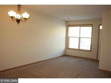 Living room area has a large window to let in plen