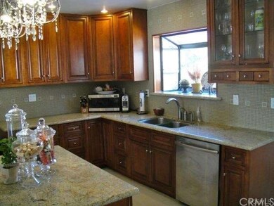 Beautifully remodeled kitchen with granite counter