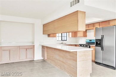 Kitchen featuring appliances with stainless steel