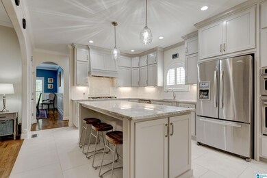 Gorgeous island with seating in kitchen. The countertops feature 