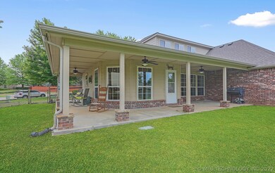 Back porch wraps around side of house.
