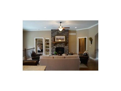 Relax by the fireplace in the Great Room.