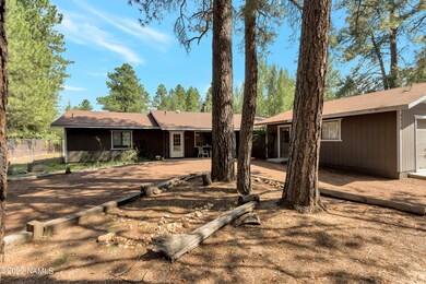 Front of home with plenty of parking
