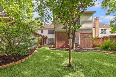 This sprawling fenced yard, with a sprinkler syste