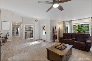 Just inside the front entry, the sitting room awaits guests.