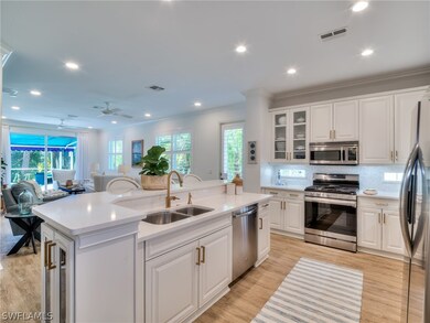 The kitchen is open to all the main living areas.