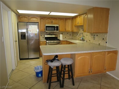 A luxurious kitchen comes with a stainless steel r