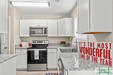 Kitchen with granite countertops, new appliances a
