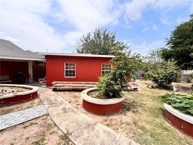 Back of property with stucco siding