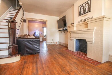 Fireplace and Hardwoods in the Living Room