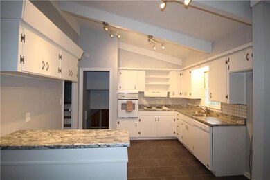 Kitchen with new counter tops and new flooring