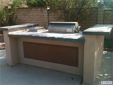 BBQ Island with Rotisserie and Stove Top Burner