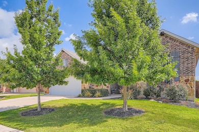 View of property hidden behind natural elements w
