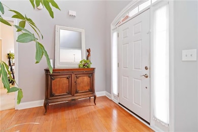 Beautiful natural light in open entry foyer