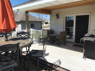 Large maintenance free decking with covered grilli