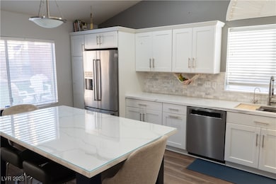 Kitchen with stainless steel appliances, tasteful