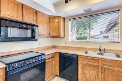 Kitchen looks out to front patio