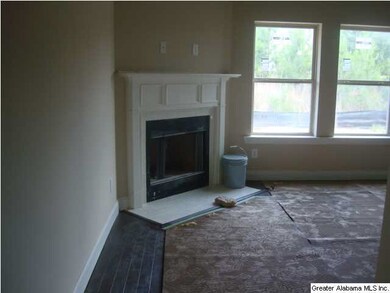 Wood burning fireplace with subway tile surround