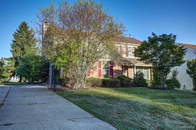 Front Area Of home & Property With Large Driveway To Home