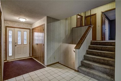 Look through to vaulted living room from kitchen