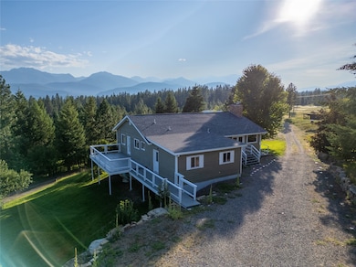 View of subject property with mountains