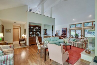 View to Foyer, Loft and Dining