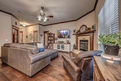 Living room with dark hardwood / wood-style floori