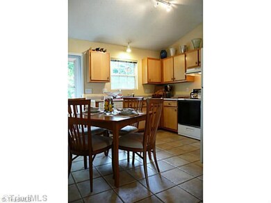 Kitchen. A wonderful space to prepare meals! Lots of cabinet and counter space plus a fantastic view of the backyard await the new owner...