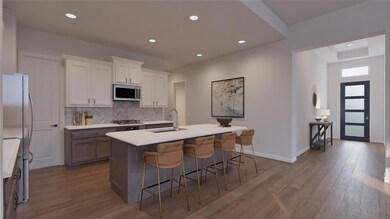 Kitchen featuring a sink, appliances with stainle