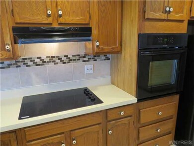 Kitchen Brand new cook top, range hood, oven and r