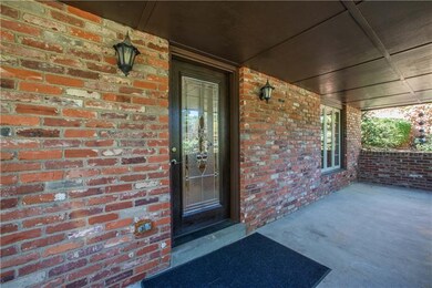 The spacious and welcoming covered front porch add