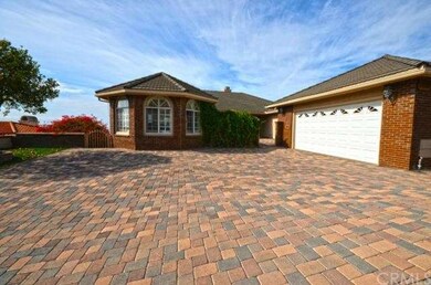 This incredible Estate features 6 bedrooms, 4.5 ba