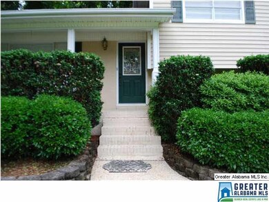 Front porch with established landscaping