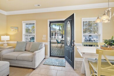 Doorway to outside featuring crown molding, a chan