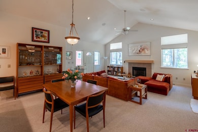 Open kitchen, dining, living areas