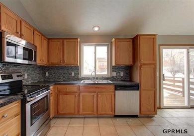 AMAZING! INCLUDES: BRAND NEW STAINLESS STEEL APPLIANCES, GLASS TILE BACKSPLASH, NEW TILE FLOORING AND FRESHLY PAINTED.  MOVE IN AND 