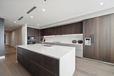 The kitchen is highlighted by Miele appliances inc