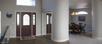 Foyer with elegant curved walls