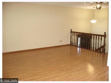 New wood laminate flooring throughout living room,