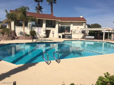 Pool with a patio area, fence, and a pergola