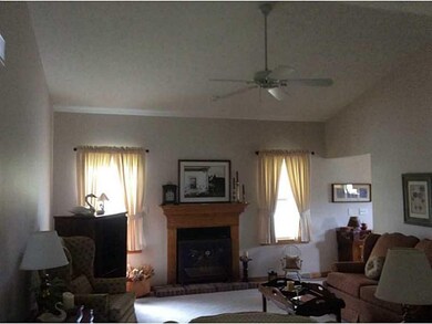 Living Room. Vaulted ceilings enhance this lovely 